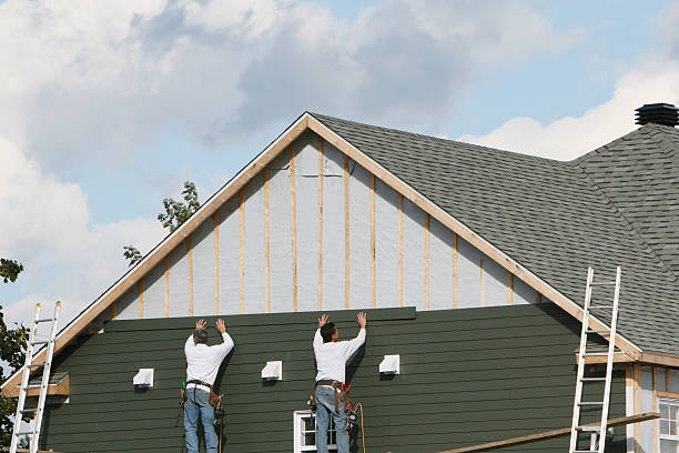 Professional Siding technician working in Laporte, CO